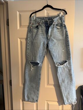 Levi's Light Blue Relaxed Fit Ripped Jeans
